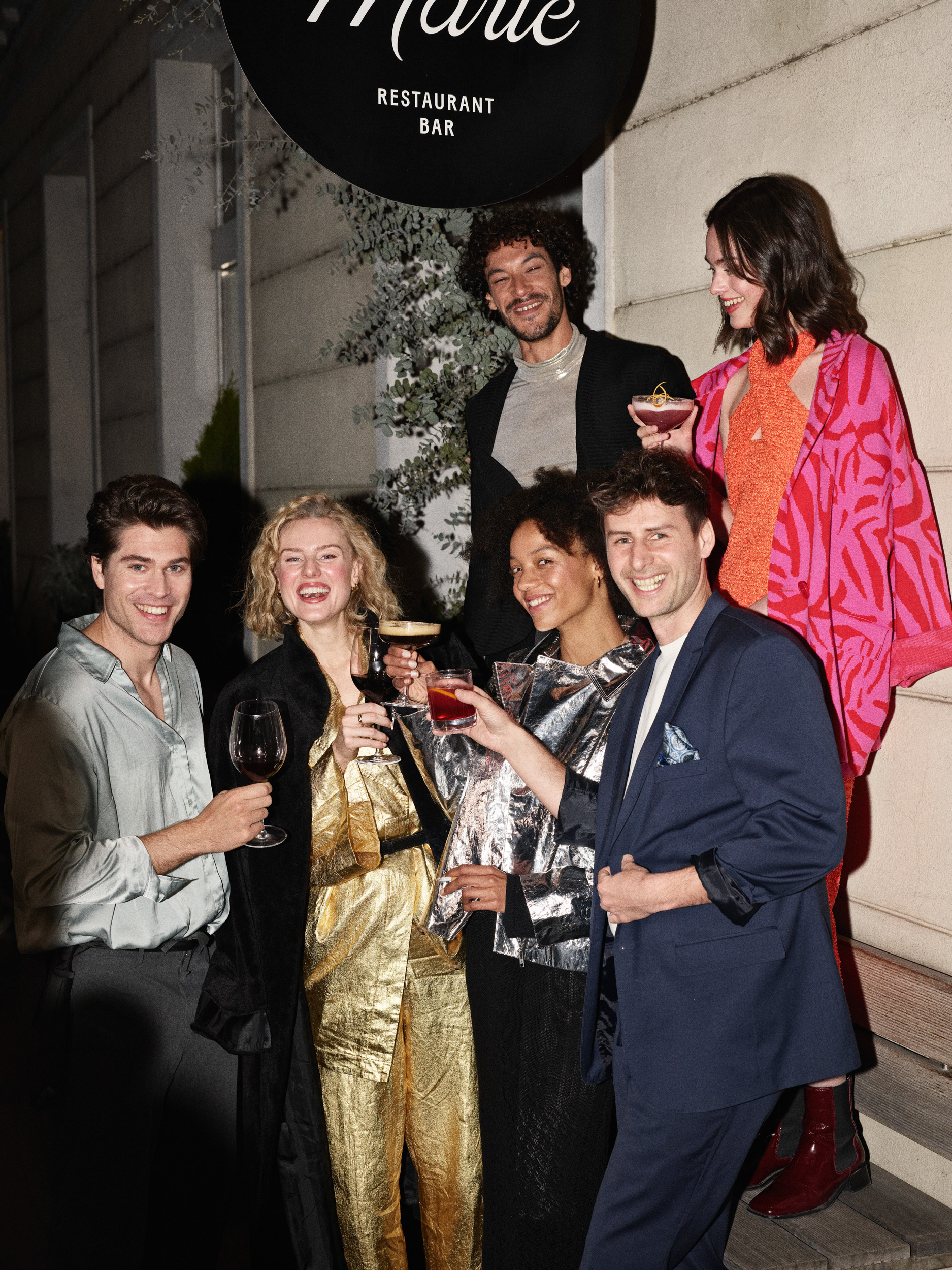 a group of people posing for a photo